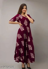 Maroon printed rayon gown with three-quarter sleeves, casual look kurti for women, suitable for office, temple, or festivals